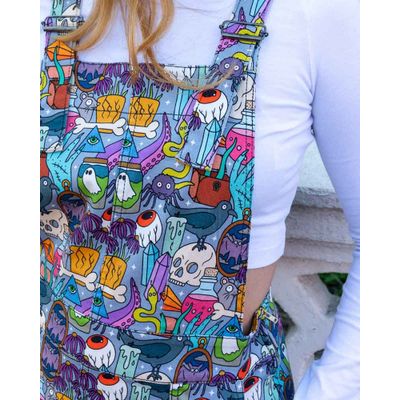 Foto van Run & Fly | Pinafore jurk met kleurrijke Spooky stuff skull print