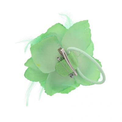 Foto van Zacharia | Mint groene roos met glitter en veertjes op haarclip broche en elastiek