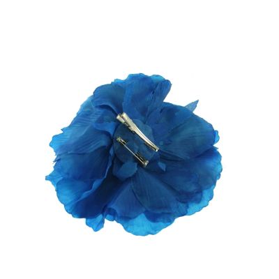 Foto van Zacharia | Blauwe roos op haarclip en broche 