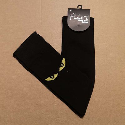 Flirt | Overknee sokken zwart met gele kattenogen